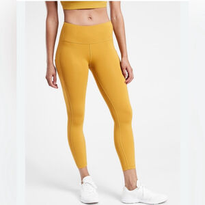 Athleta Ultimate Stash Pocket 7/8 Tight size medium yellow